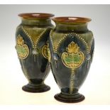 A pair of Victorian Doulton Lambeth ovoid vases decorated in the Art Nouveau style by Ethel Beard,