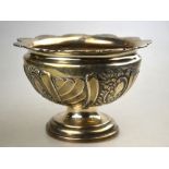 An Edwardian silver rose bowl with embossed decoration, on stemmed foot, Henry Williamson Ltd.