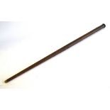 A vintage walking stick/air rifle with middle screw action and button trigger,