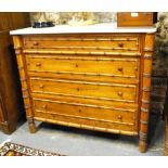 A 19th century marble topped pine and faux bamboo commode chest of four long drawers to/w a