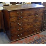 A George III mahogany five drawer chest retaining the original brass swan-neck fittings,
