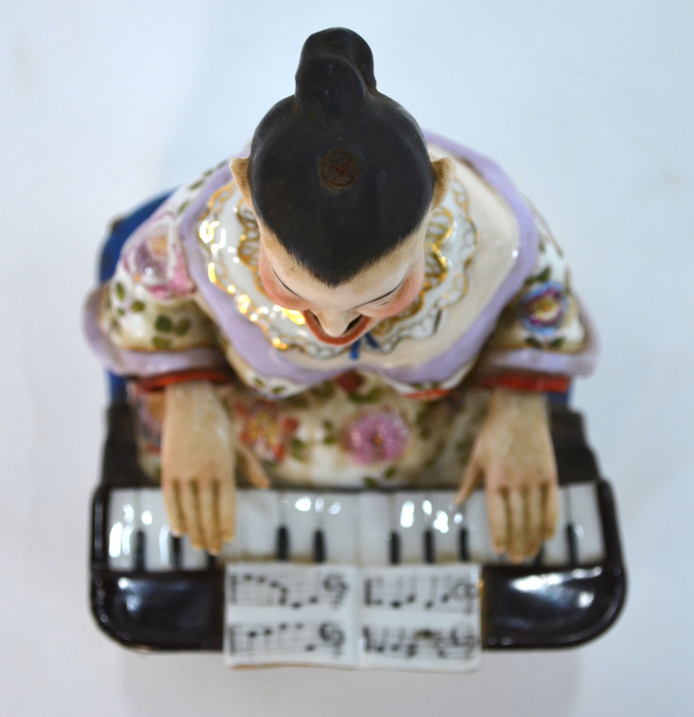 A Dresden-style Chinoiserie figure of a seated piano player with articulated head and arms, - Image 8 of 9