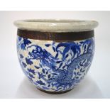 A Chinese planter or small fish bowl, decorated in underglaze blue with two four-clawed dragons,