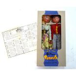 A 1960's un-played with doll in wedding dress, 62 cm to/w a boxed Pelham Puppets Twin-Pac,