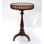 A William IV rosewood pedestal tripod table with circular spiral gallery top,