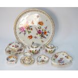 An associated Dresden caberet set: including: a chocolate cup and saucer; two shell-shaped dishes;