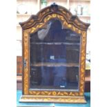 An antique Dutch floral marquetry domed top table cabinet with glazed panel door enclosing two