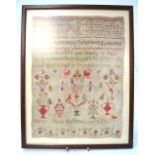 A George IV cross stitch sampler, worked with alphabets, numerals,