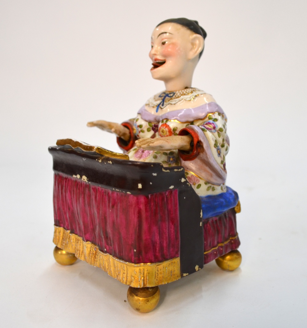 A Dresden-style Chinoiserie figure of a seated piano player with articulated head and arms, - Image 3 of 9