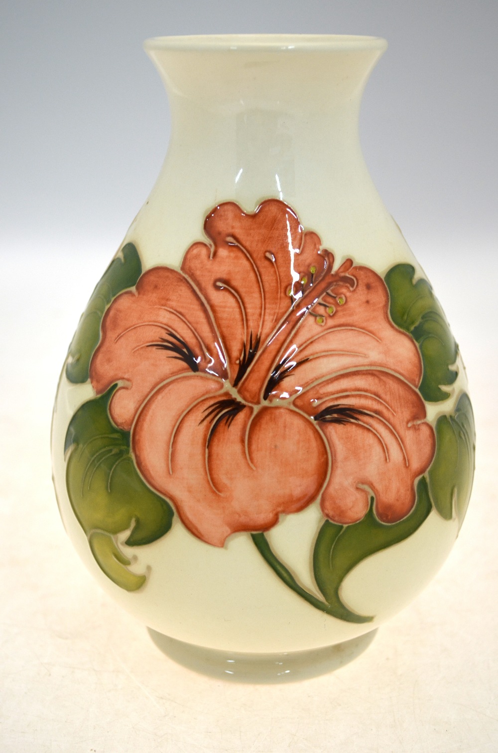 A Moorcroft vase decorated with the Hibiscus pattern on a cream ground, - Image 3 of 5