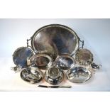 A large electroplated oval tray with twin cast handles, to/w a salver on claw and ball feet,