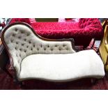 A Victorian mahogany framed button upholstered chaise longue,