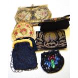 A tapestry evening bag with chain and gilded clasp,