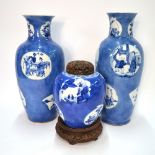 A pair of powder-blue ground oviform vases;