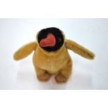 A stuffed mohair toy penguin chick with glass eyes,