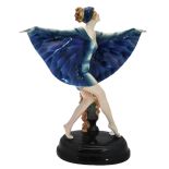 An Art Deco, 'Captured Bird', figure of a striding girl by Goldscheider,