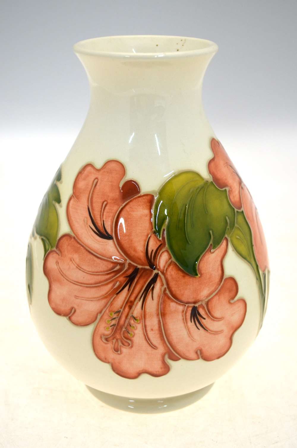 A Moorcroft vase decorated with the Hibiscus pattern on a cream ground, - Image 4 of 5