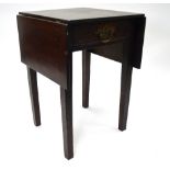 An 18th century square drop leaf occasional table with frieze drawer, raised on square section legs,