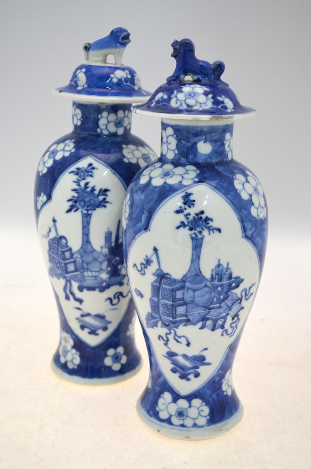 A pair of blue and white vases and covers; 26 cm high; each base with a Kangxi four-character mark, - Image 7 of 8