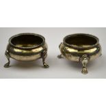 A pair of Victorian silver small circular open salts with beaded rims and hoof feet, Henry Holland,