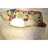 A collection of assorted table linen to include examples floral embroidered with colourful cottons,