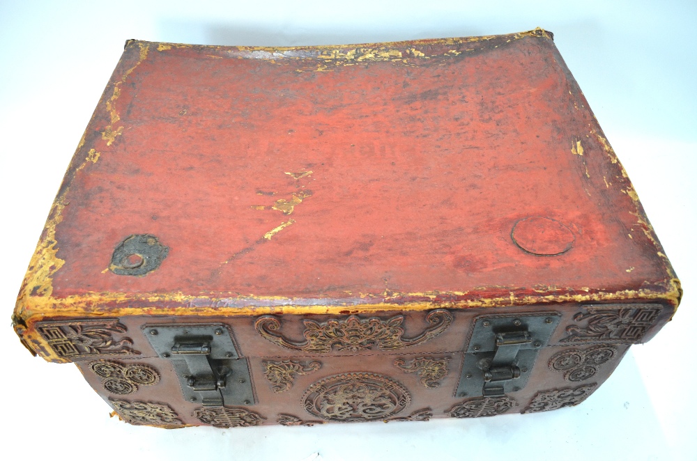 A Chinese red leather chest and cover of rectangular form, - Image 3 of 12