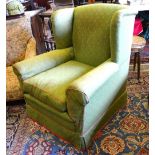 Howard chairs Ltd, London, a wingback jade green crimson piped covers, with overarm protectors,