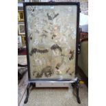 A silk or textile embroidery, decorated with birds and other natural history designs,