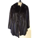 A dark brown mink coat by Alma Furs, Wimbledon,