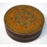 A cylindrical lacquer box and cover, decorated with Eight sacred emblems surrounding a shou symbol,