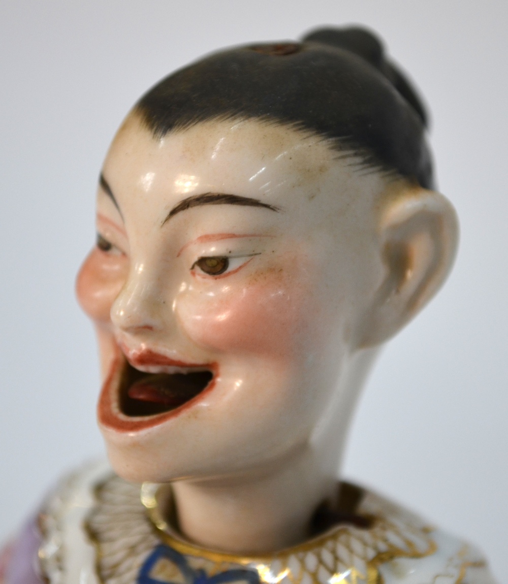 A Dresden-style Chinoiserie figure of a seated piano player with articulated head and arms, - Image 9 of 9
