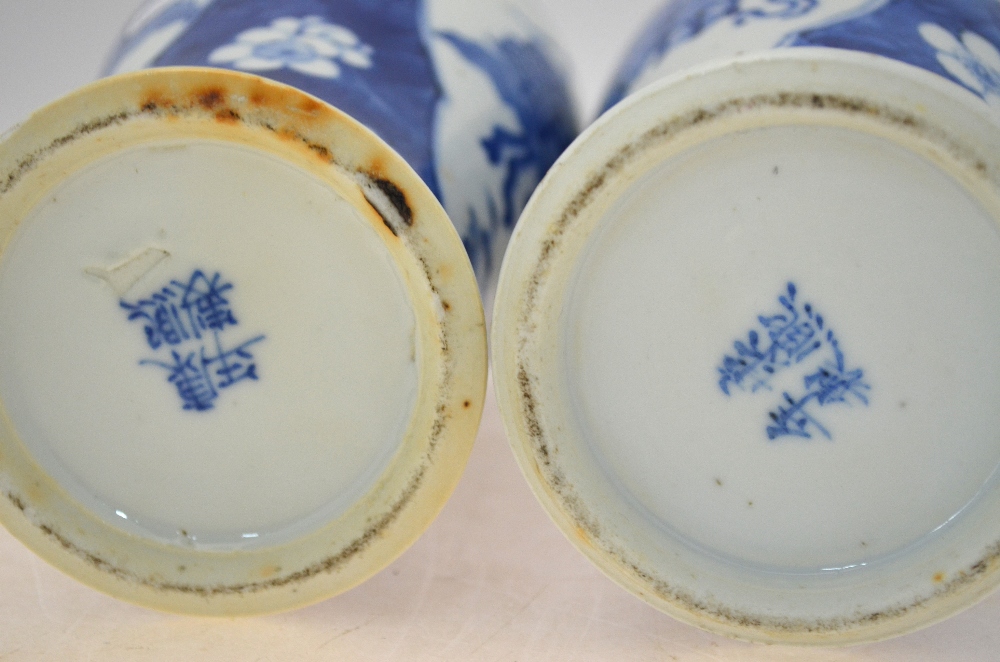 A pair of blue and white vases and covers; 26 cm high; each base with a Kangxi four-character mark, - Image 6 of 8