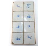 A set of eight Dutch Delft underglaze blue tiles decorated with simple designs including rabbits,