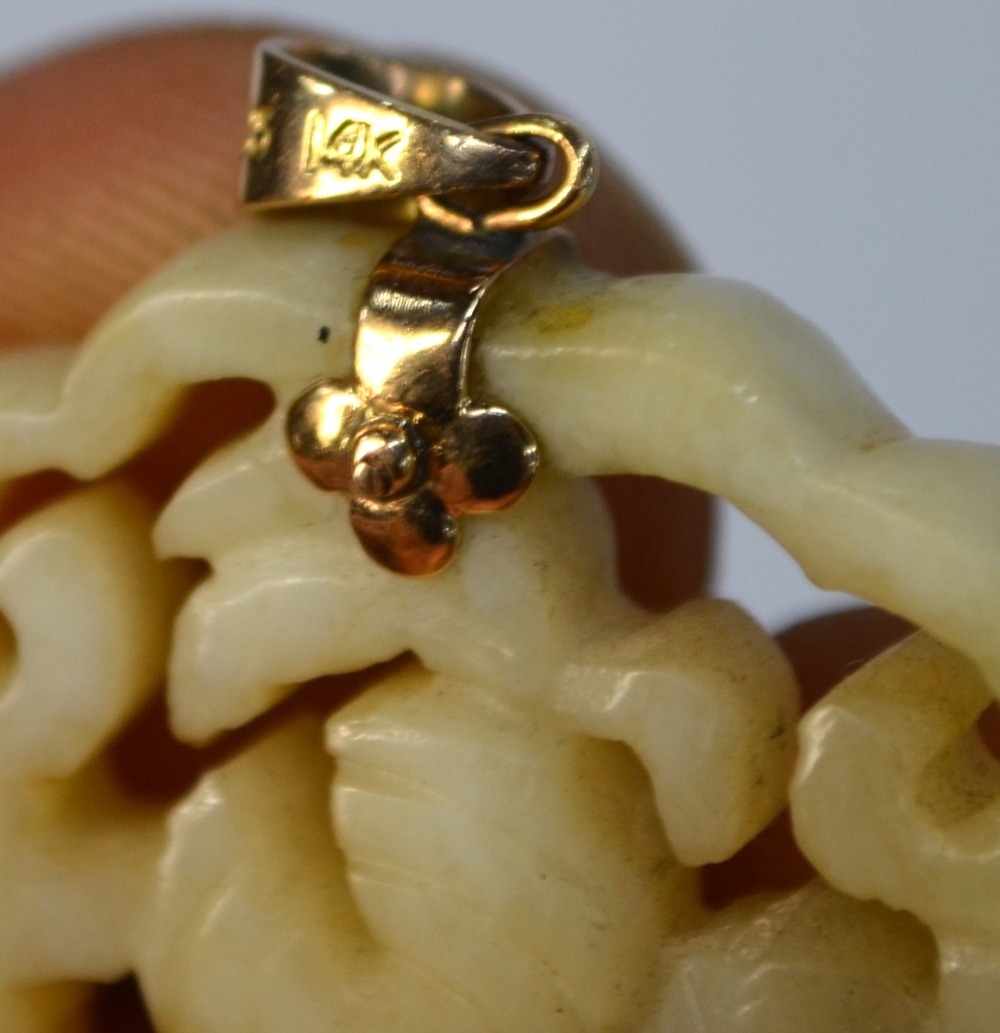 Two green jade pendants of reticulated form: one decorated with a flower arrangement; - Image 5 of 5