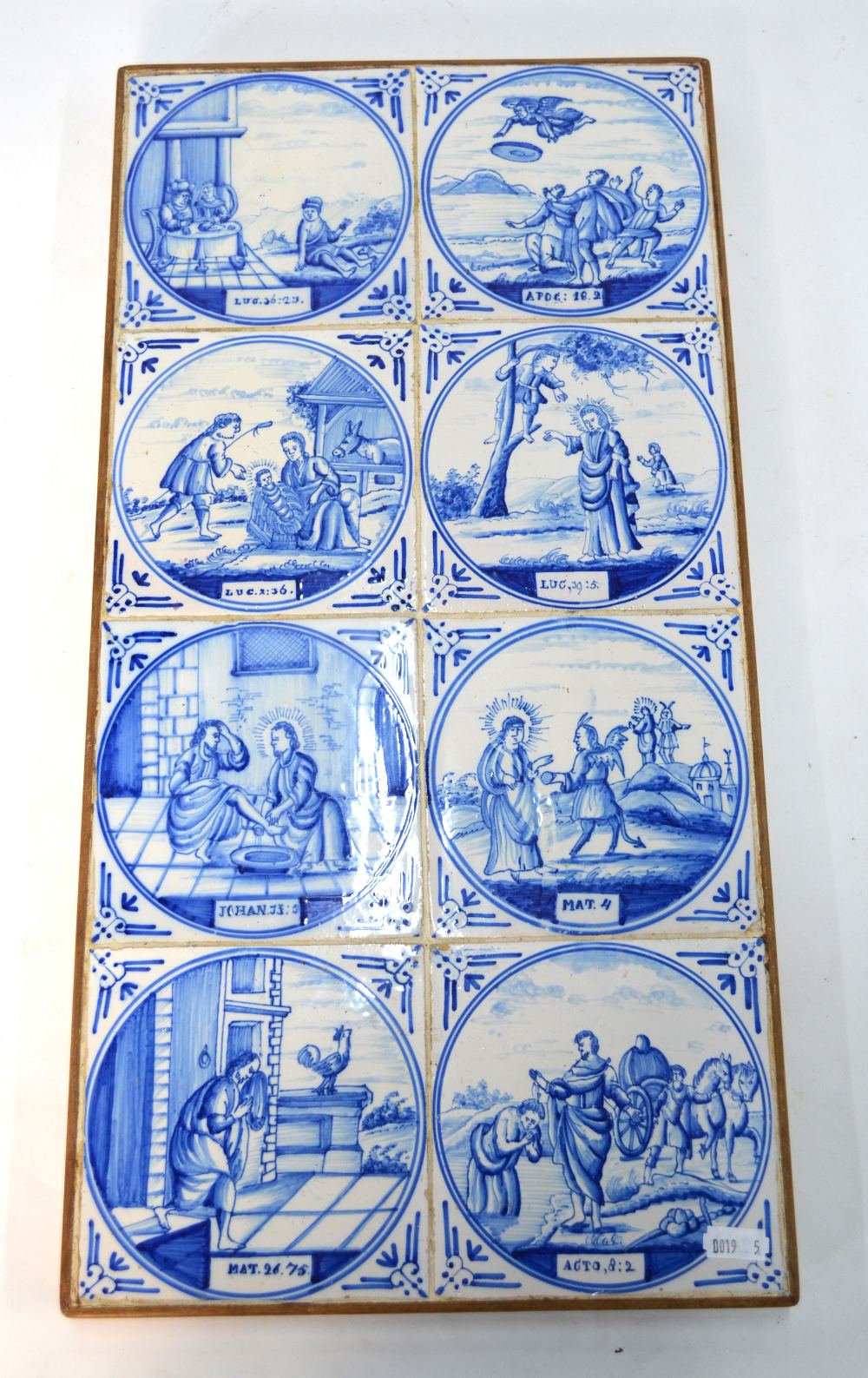 A set of eight blue and white Dutch Delft tiles depicting scenes from the New Testament, 12.5 x 12.