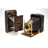 A Butchers 'Cameo' quarter-plate folding camera with tripod