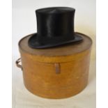 A black silk top hat 'Extra Quality' with monogram printed on ivory moire silk lining, 54 cm circ.