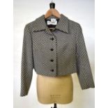 A 1970s Jaeger lady's black/white checked wool skirt suit with short, box-shaped jacket, size 16,
