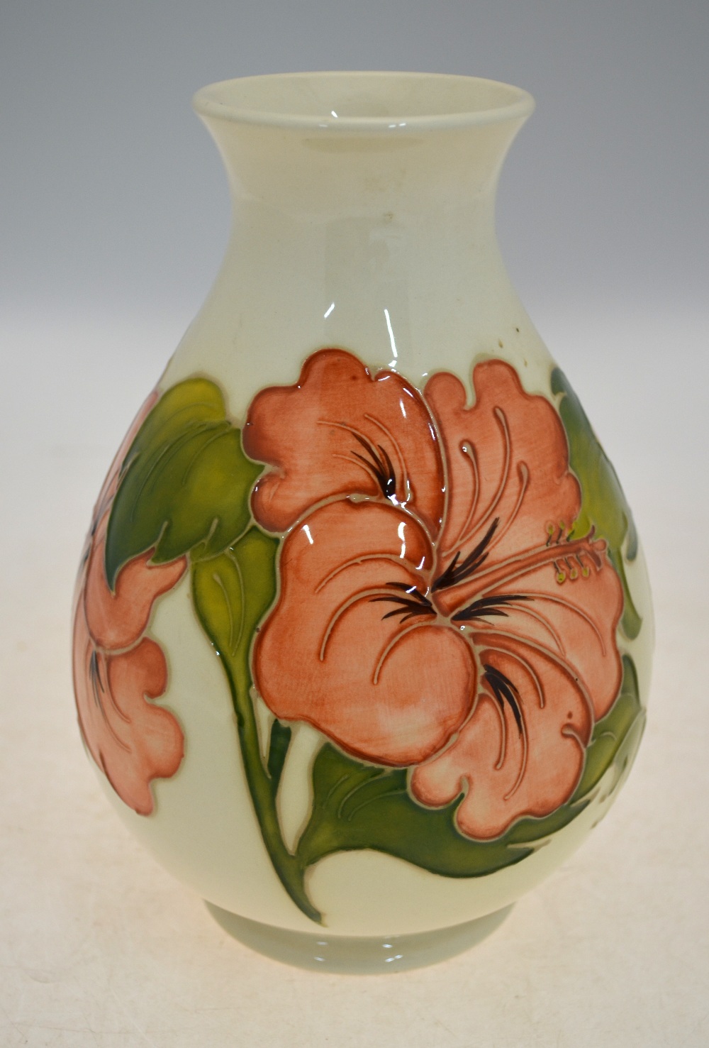 A Moorcroft vase decorated with the Hibiscus pattern on a cream ground, - Image 2 of 5