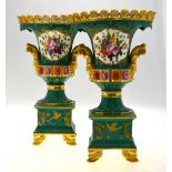 A pair of Continental porcelain vases, green ground decorated with raised gilding,