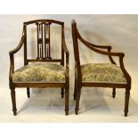 A pair of 19th century Italian provincial fruitwood open armchairs having pierced vertical spats