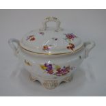 A German porcelain tureen and cover with loop handle finial,