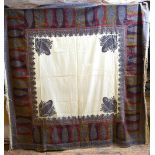 A 1900s cream ground finely worked wool Kashmiri shawl with deep paisley border in red,