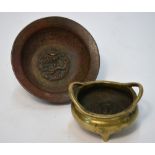 A small gilt metal tripod incense burner with two handles,