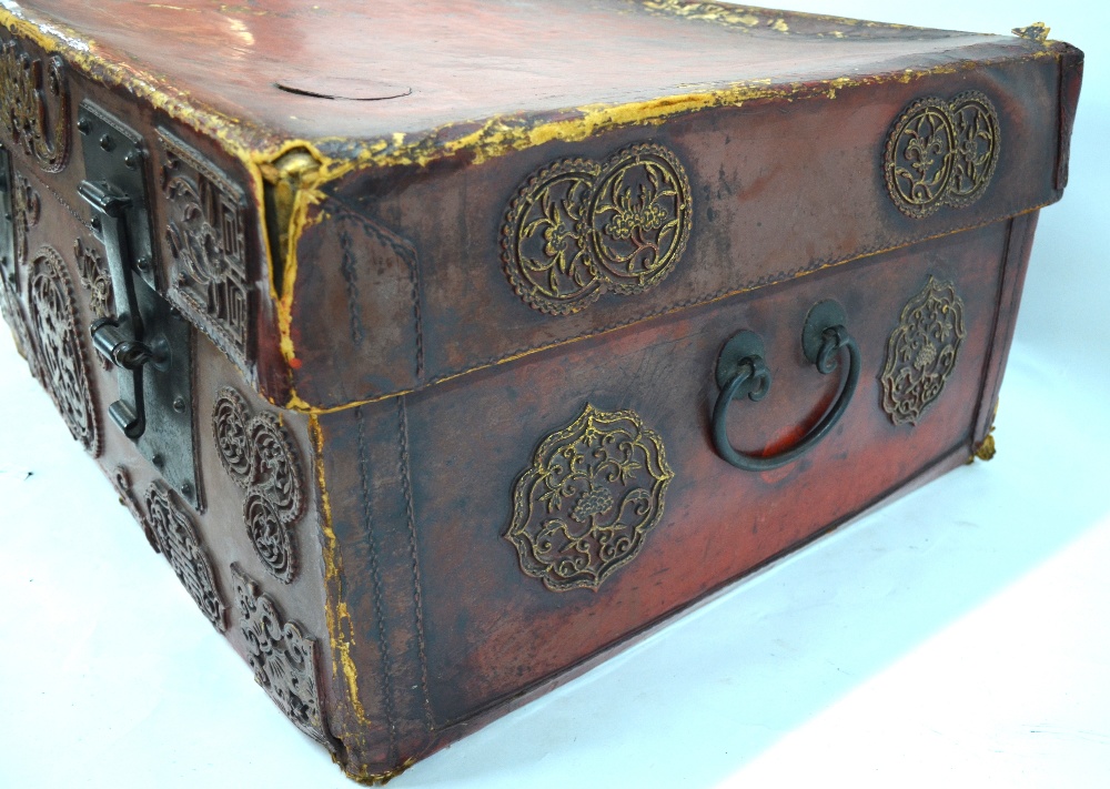 A Chinese red leather chest and cover of rectangular form, - Image 6 of 12