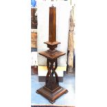 An unusual mahogany standard lamp of substantial proportions,