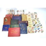 Various albums of cigarette cards and an album of postcards etc (box)