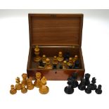 A turned wood Staunton pattern chess set, king 9 cm, to/w a matching spare white king and pawn,