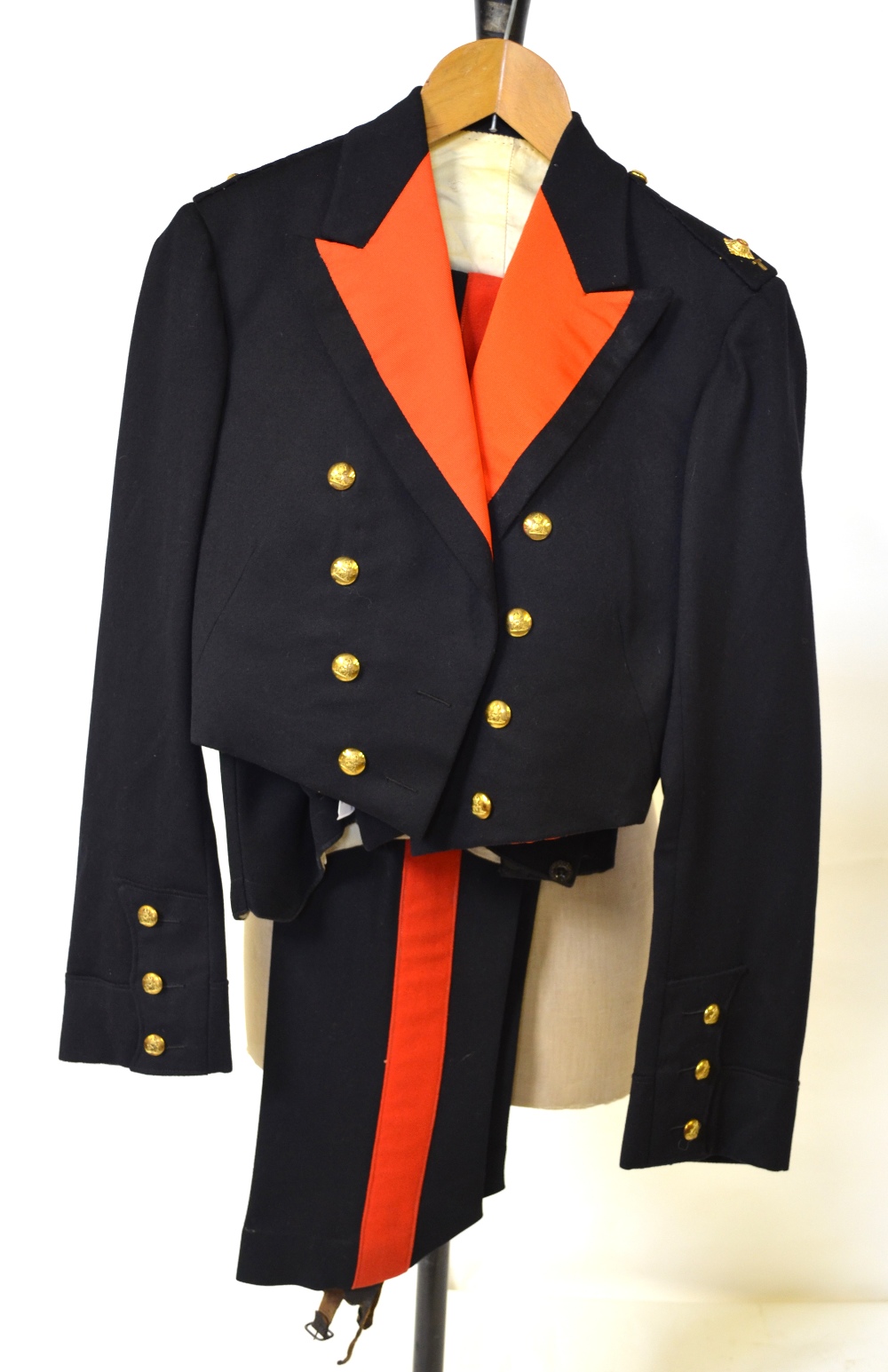 A vintage Royal Artillery dress uniform complete with waistcoat and full complement of brass