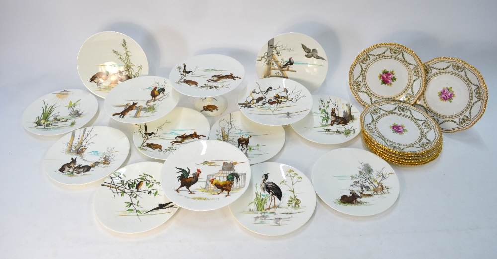 A Victorian porcelain dessert service comprising four tazzas and ten plates,